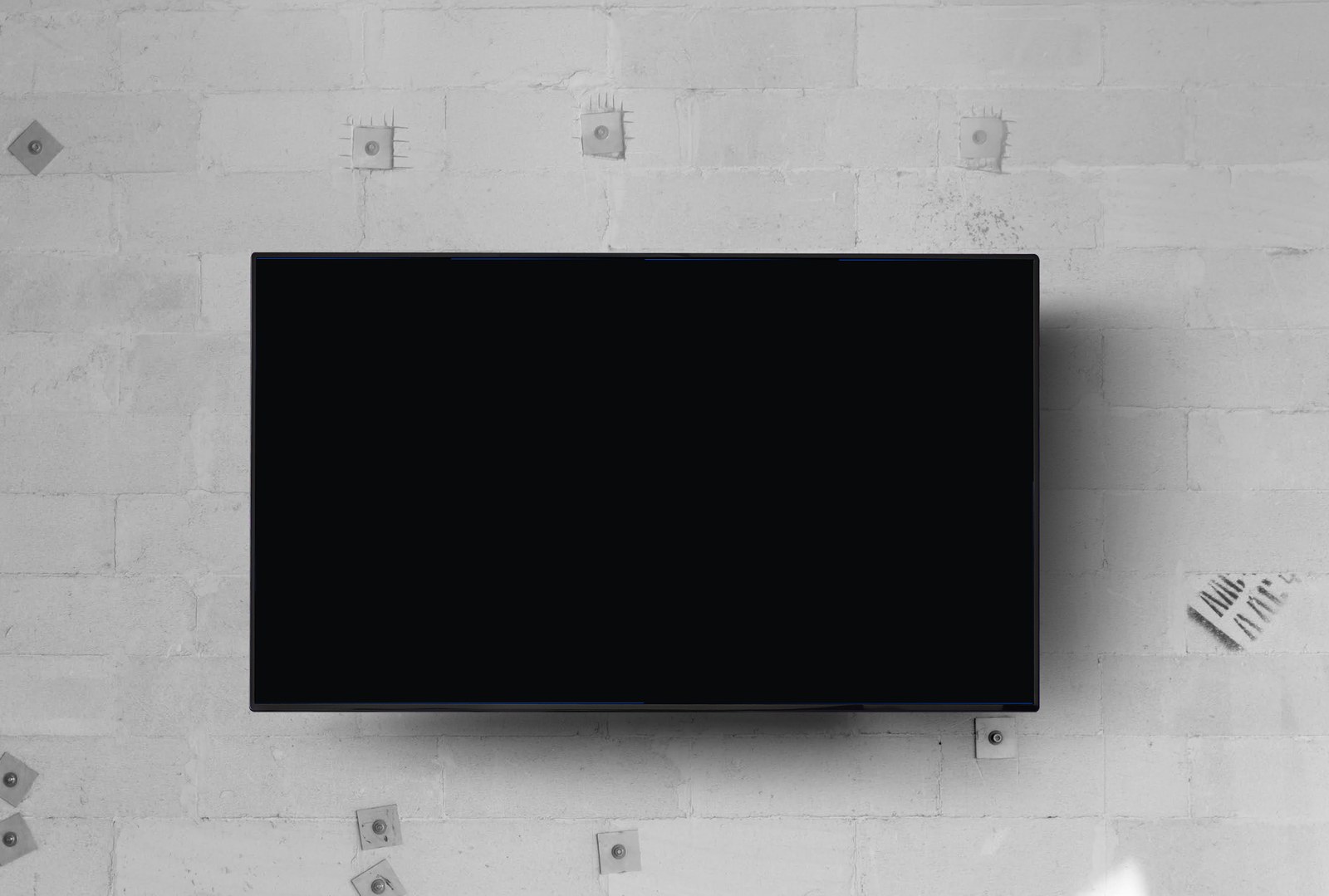 onday digital signage playing on a wall-mounted landscape TV
